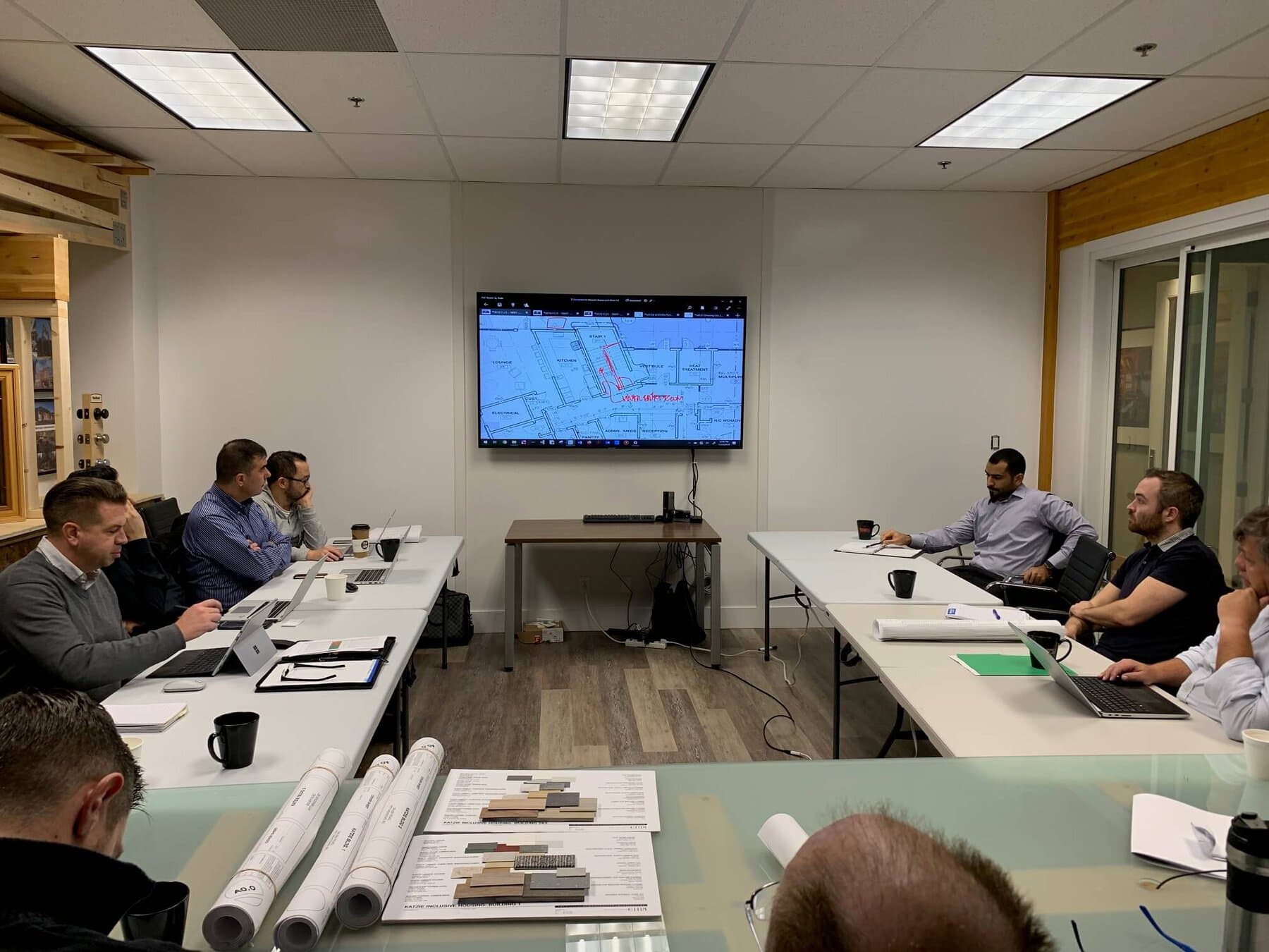 Tamlin staff in large board room